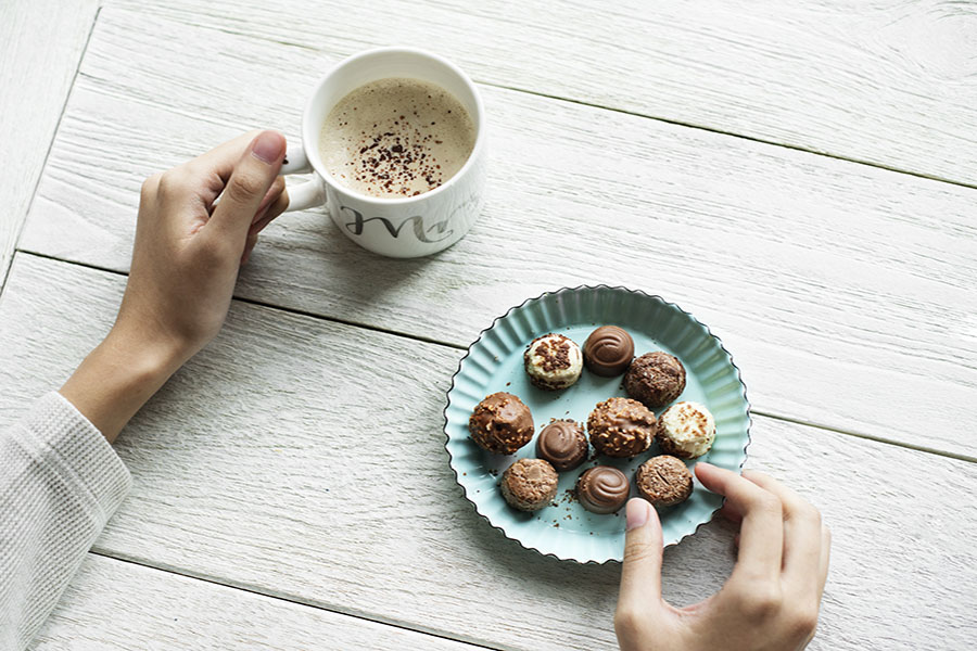 hand with coffee