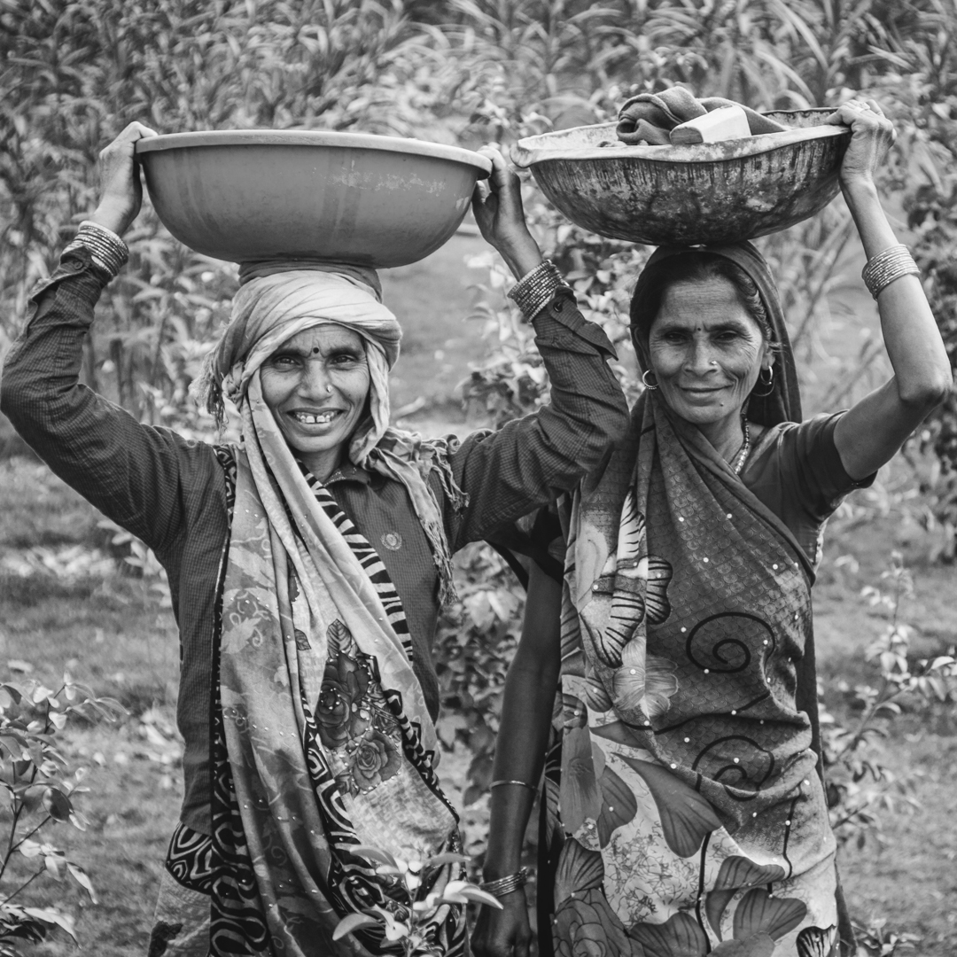 Women carrying baskets